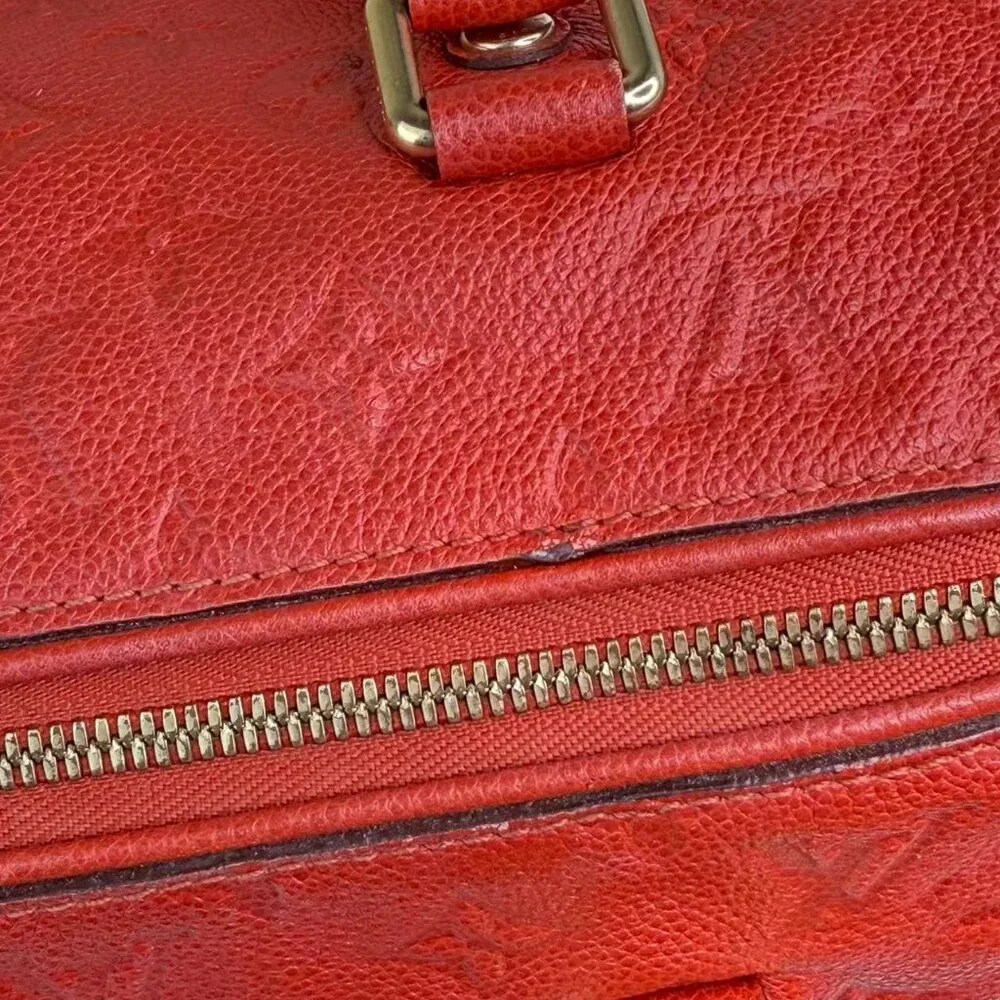 Louis Vuitton Orange Leather Empreinte Speedy 25 Crossbody Bag with Gold Hardwar